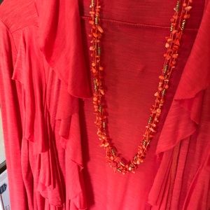 Boho bright coral jersey overlayer and necklace.